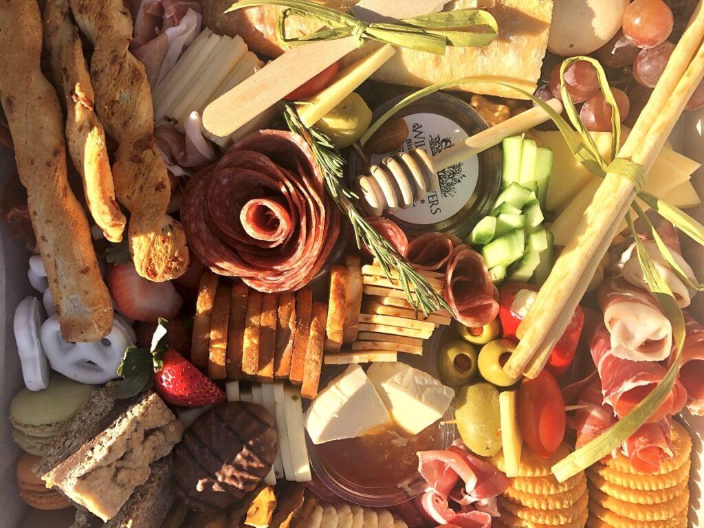 a artisan boc of cheese meats and crackers from Wildflower Bistrol