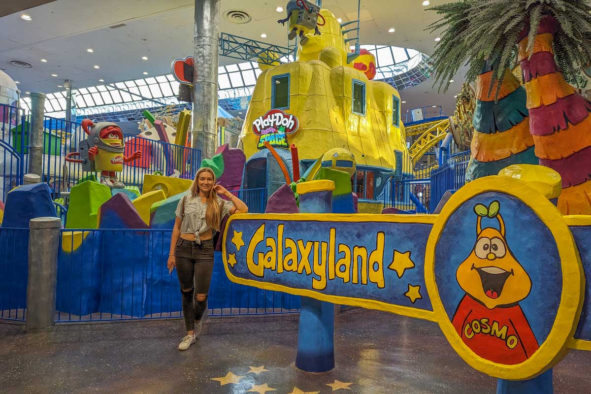 Bailey poses for a photo with the Galaxy Land sign in the West Edmonton Mall, Edmonton, Alberta