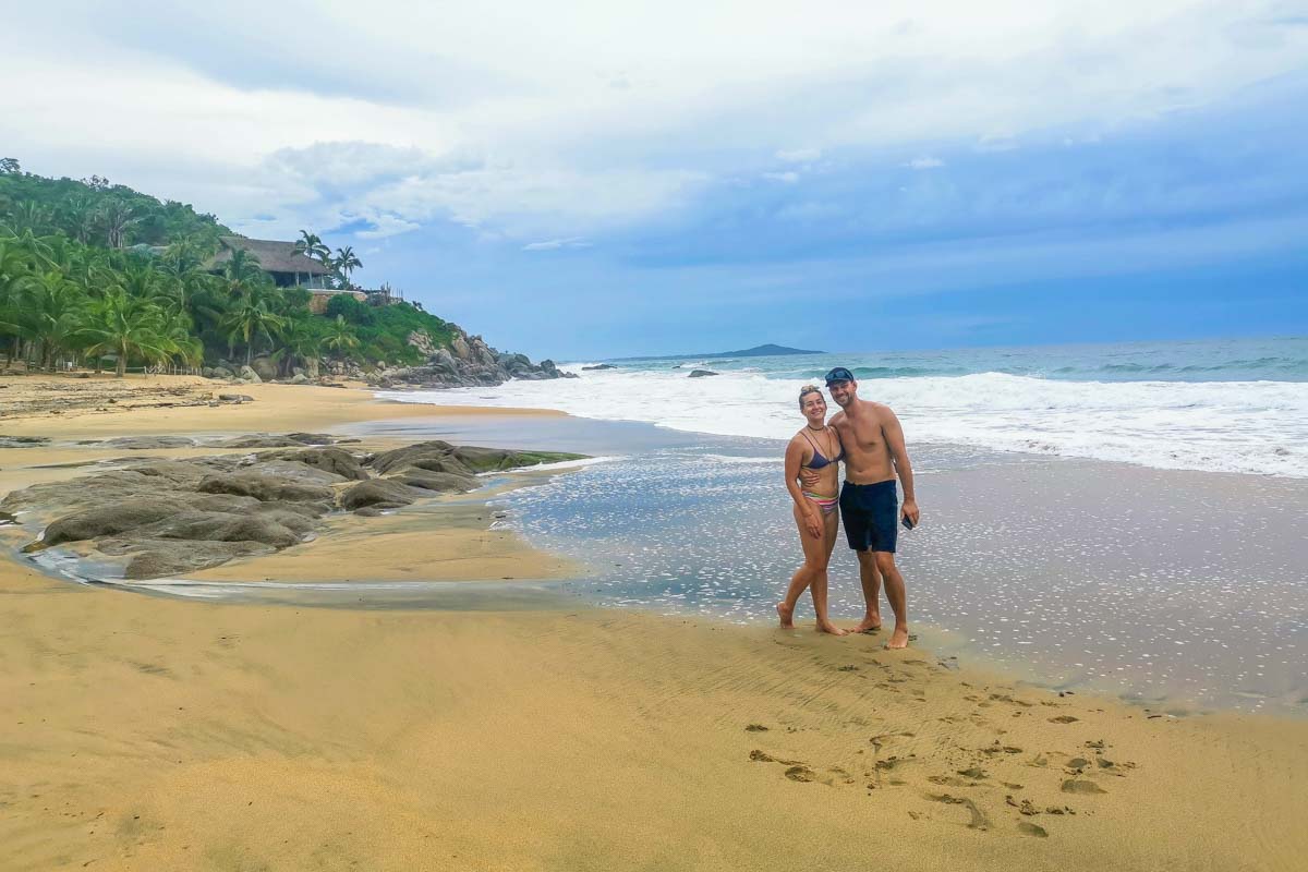 Bailey and Daniel get a photo together at Carricito beach