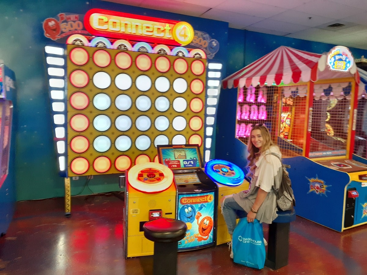 girl playing a game in Galaxyland in West Edmonton Mall