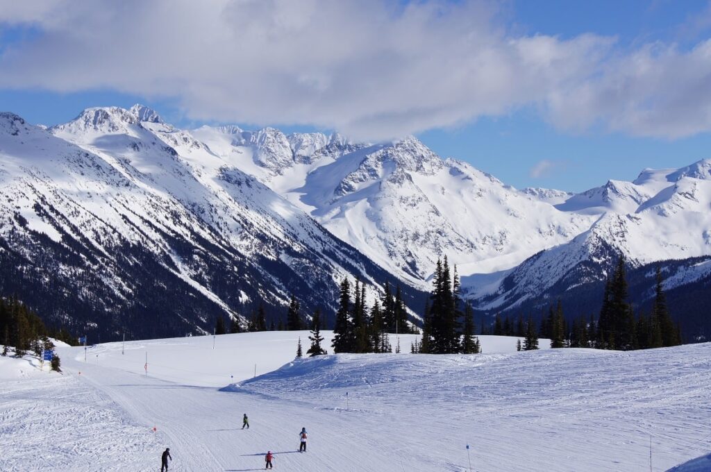 people skiing on the mountain in Whistler