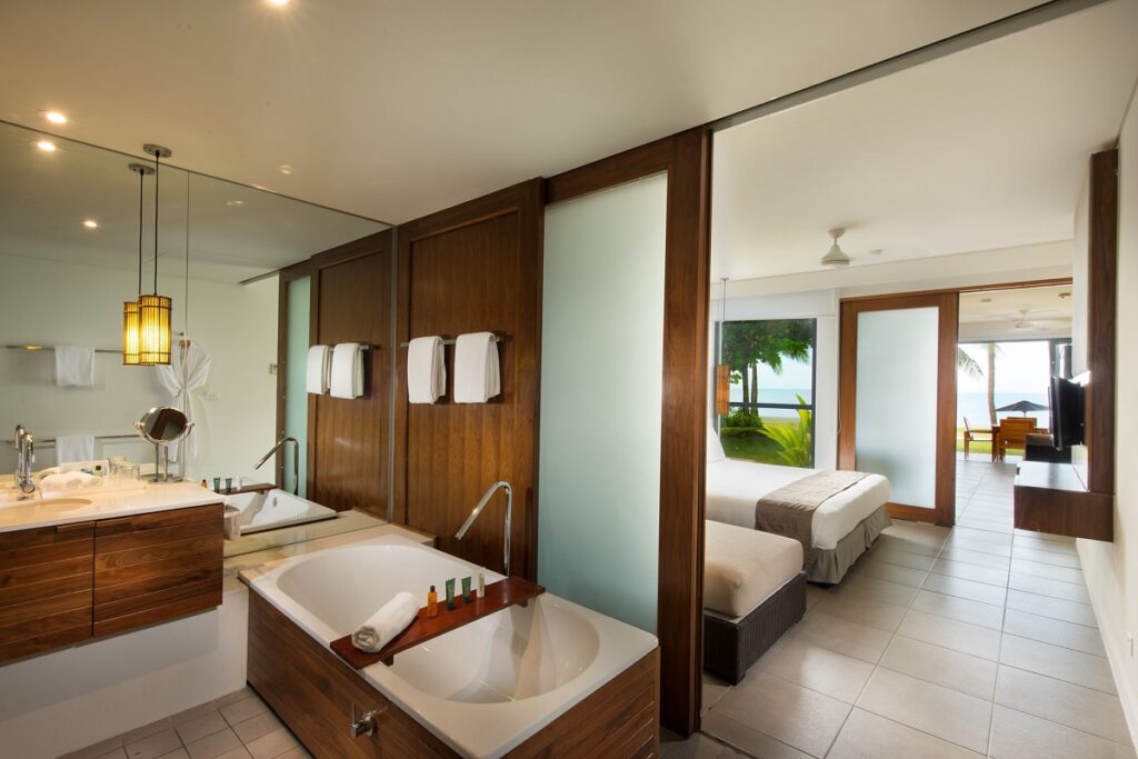 inside the bathroom and room at the Hilton in Fiji