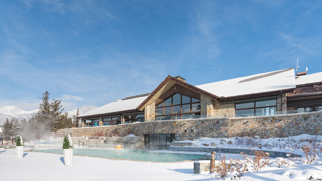 Fairmont Jasper Park Lodge on a winter day covered in snow