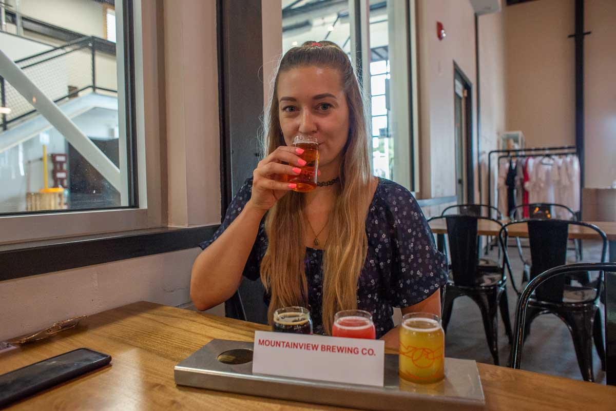 Bailey drinks beer at Mountainview Brewing in Hope, BC