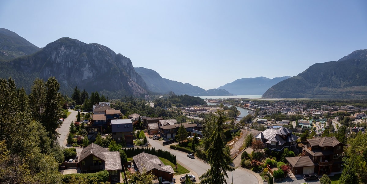 view of Squamish town from above with a mountain backdrop