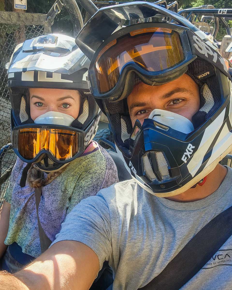 Daniel and Bailey take a selfie in a 4wd buggy in Whistler, BC