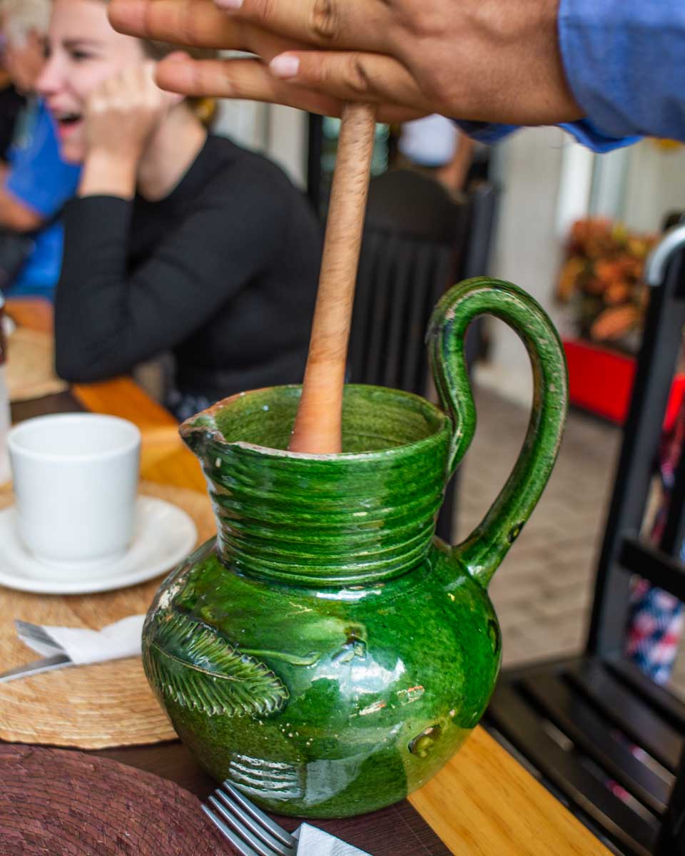 A man mixes a traditional hot chocolate in Oaxaca, Mexico