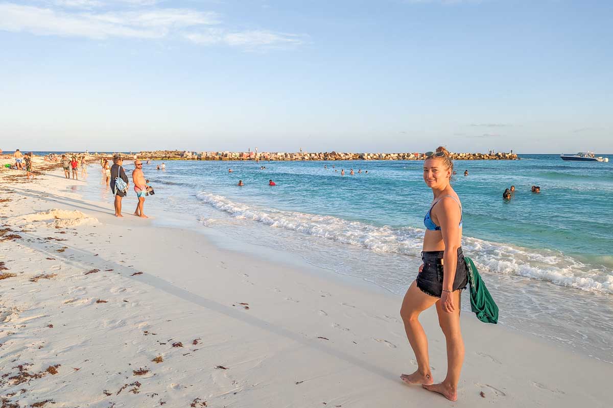 Bailey enjoys a walk on Playa Gaviota Azul during sunset in Cancun, Mexico