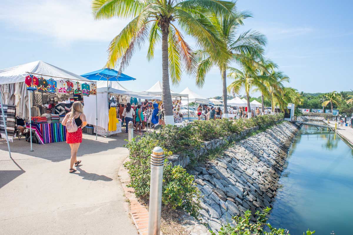 Bailey walks through the La Cruz Market