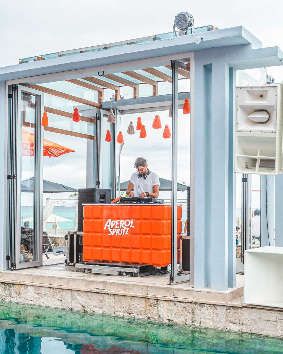 A dj plays at Mamita's Beach Club in Playa del Carmen, Mexico