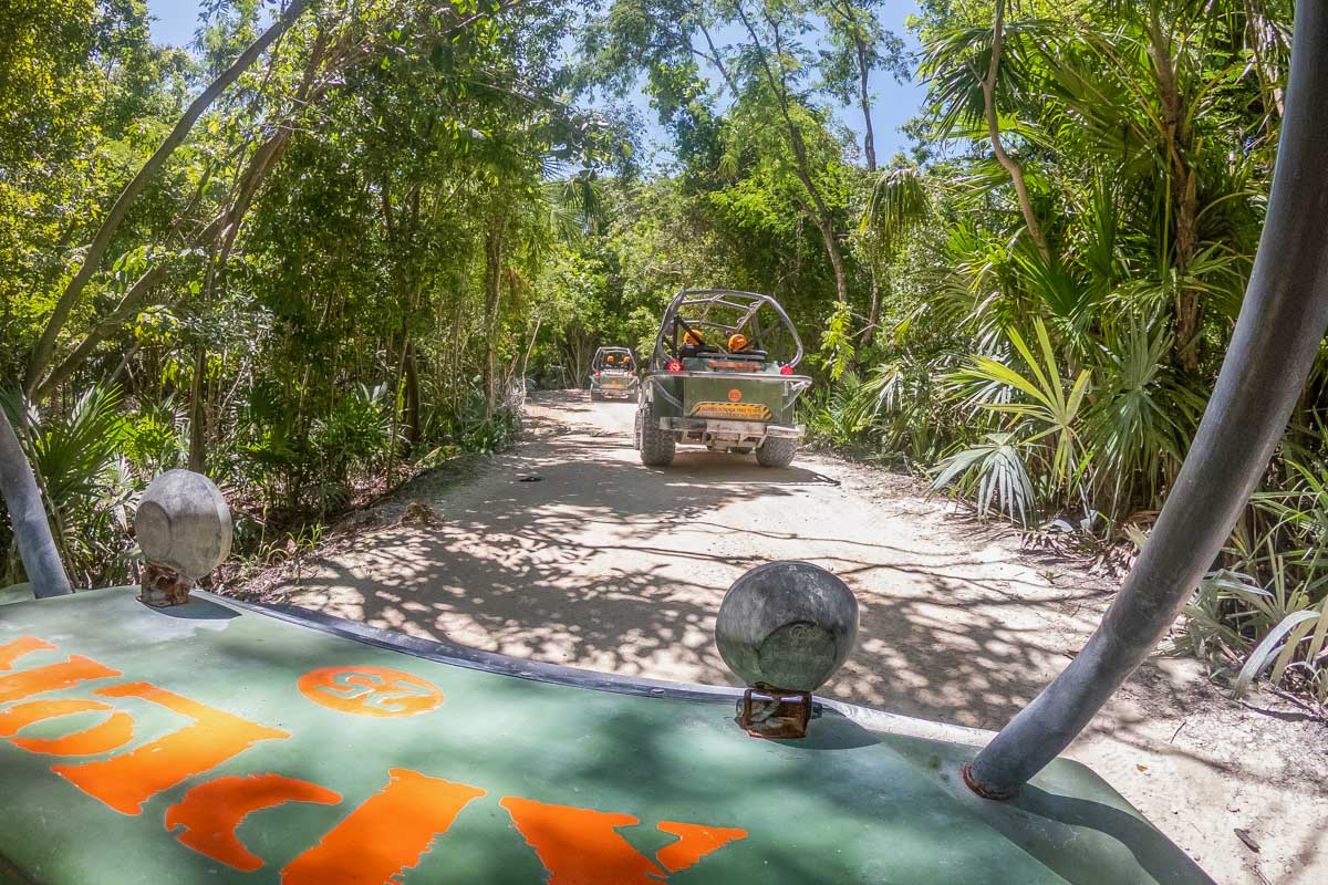 People ride ATVs at Xplor Adventure Park, Mexico