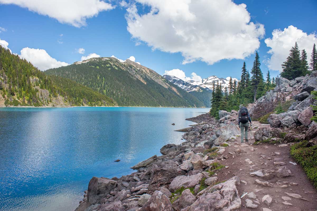 A lady walks along The trail just before the Garibaldi Lake Campground in British Columbia, Canada