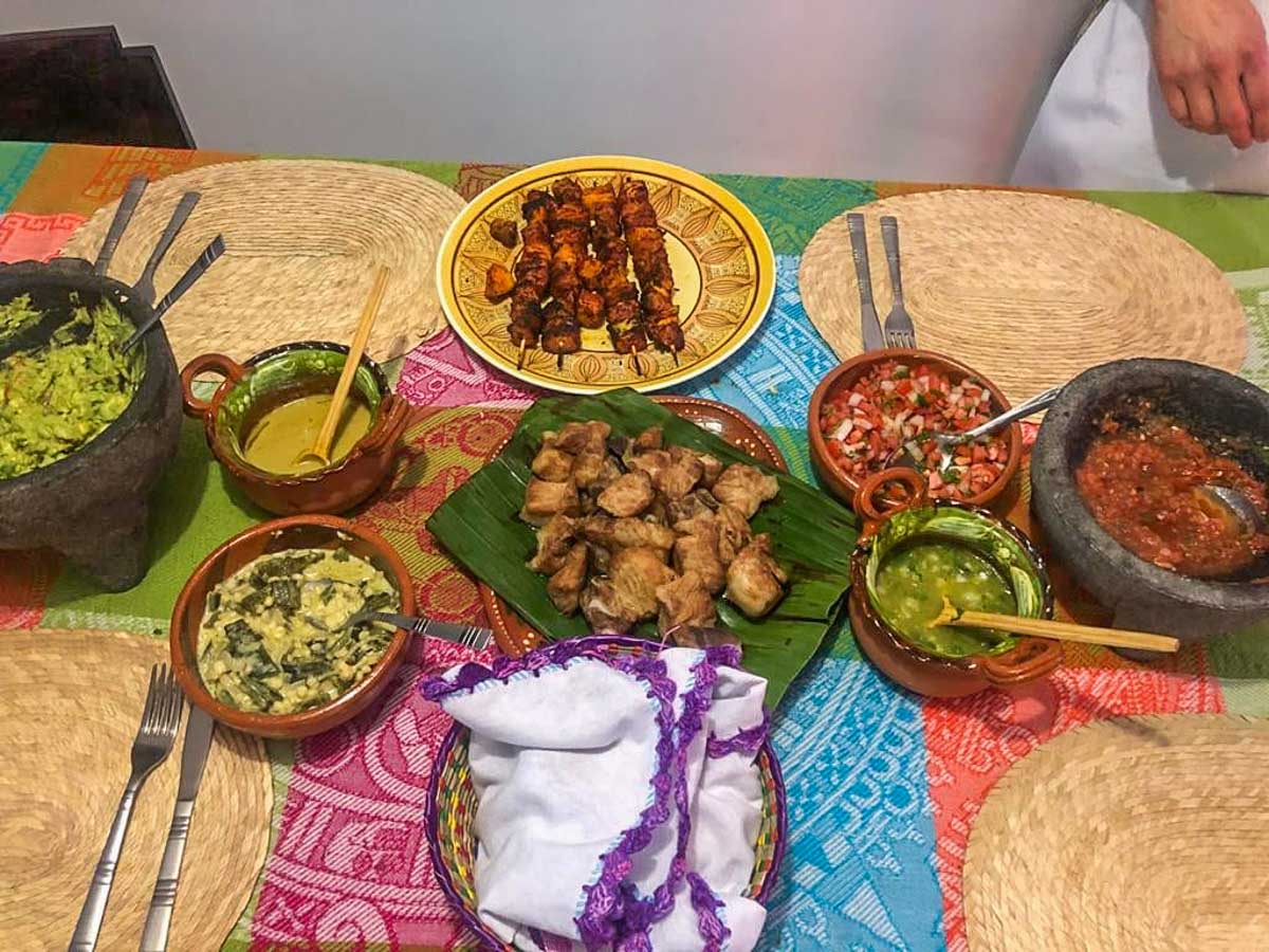A spread of food at Cookin Cabo after a cooking tour in Cabo San Lucas, Mexico