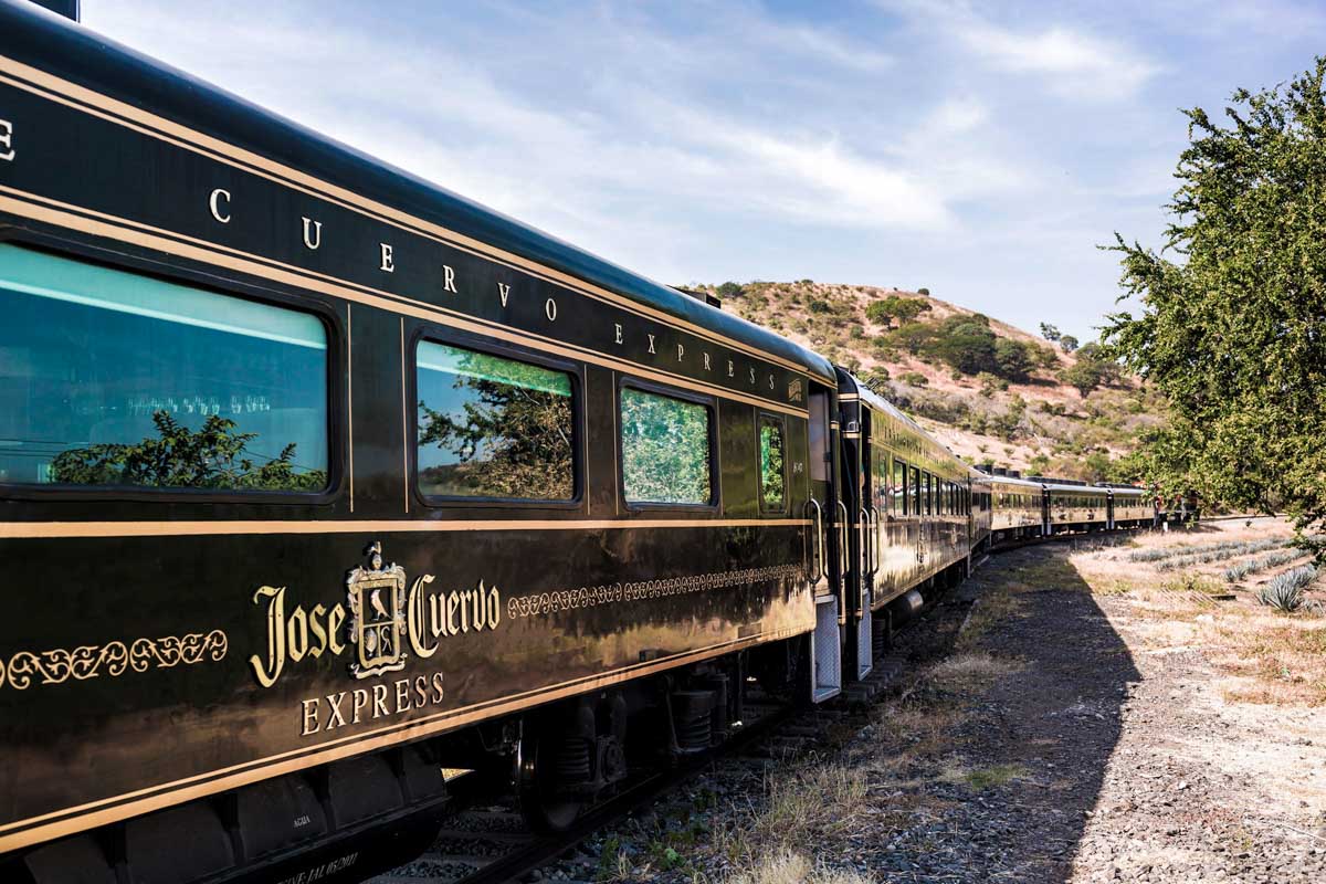 Jose Cuervo Express traveling along some tracks in Mexico