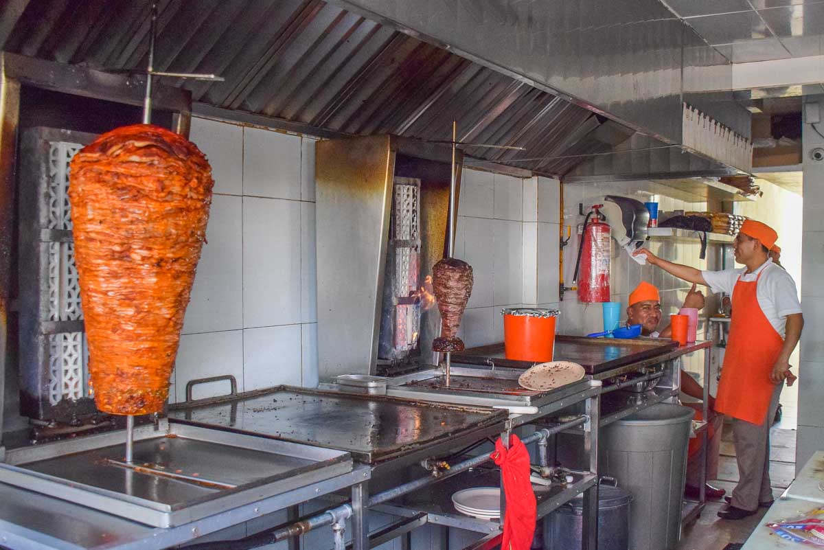 Meat cooks at Tropi Tacos, Palenque, Mexico