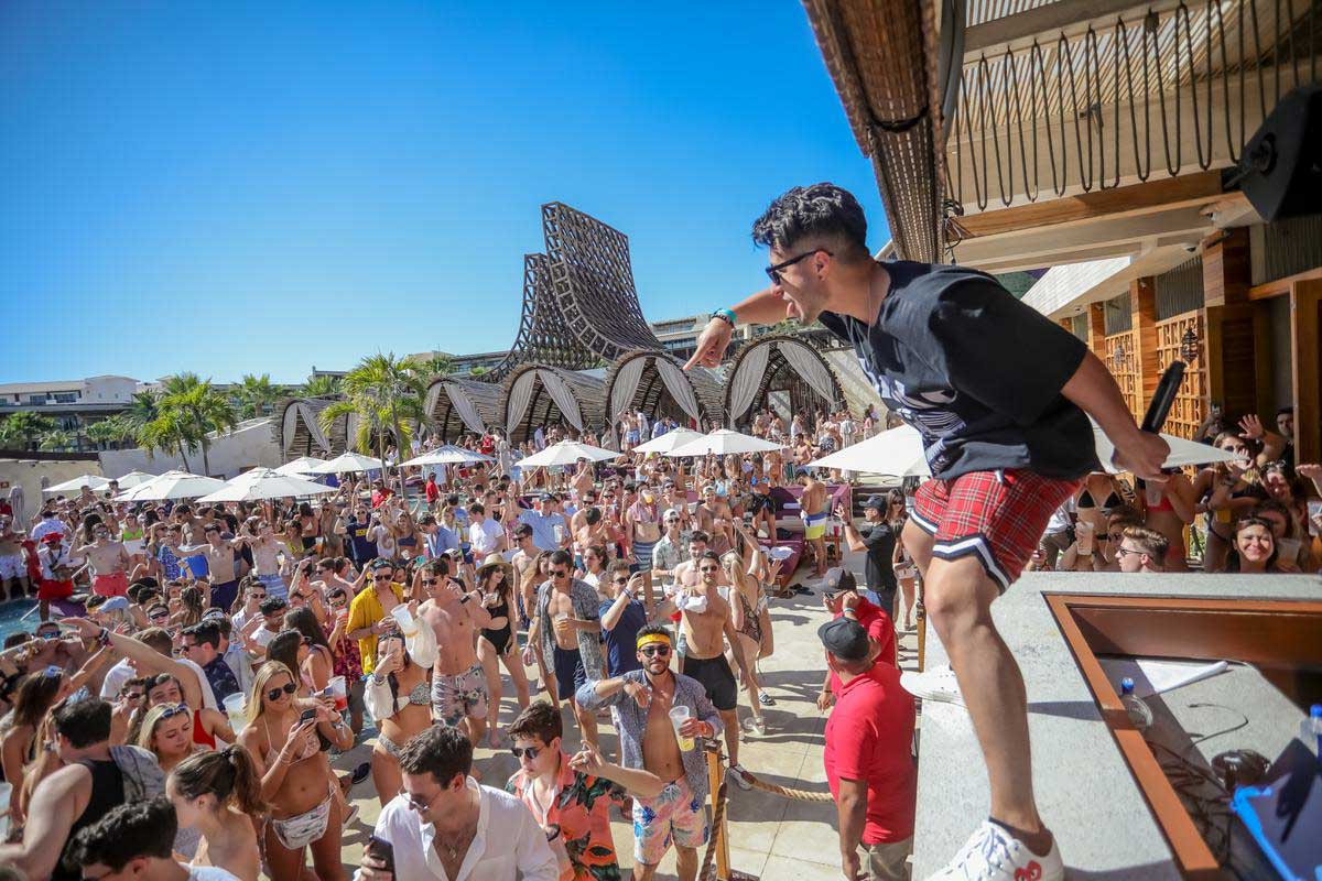 A dj performs to a crowd of people at OMNIA Cabo San Lucas, Mexico 