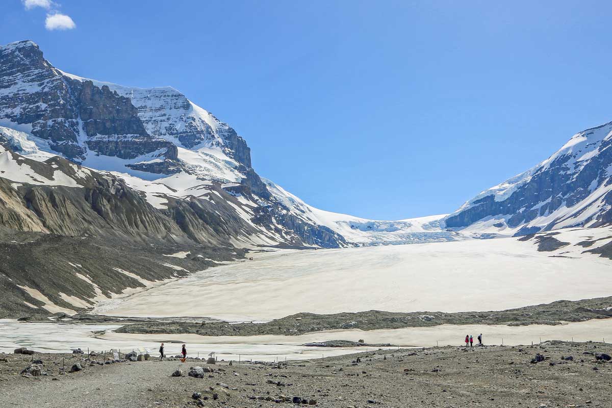 View of people walking to the Athabasca Glacier on the trail