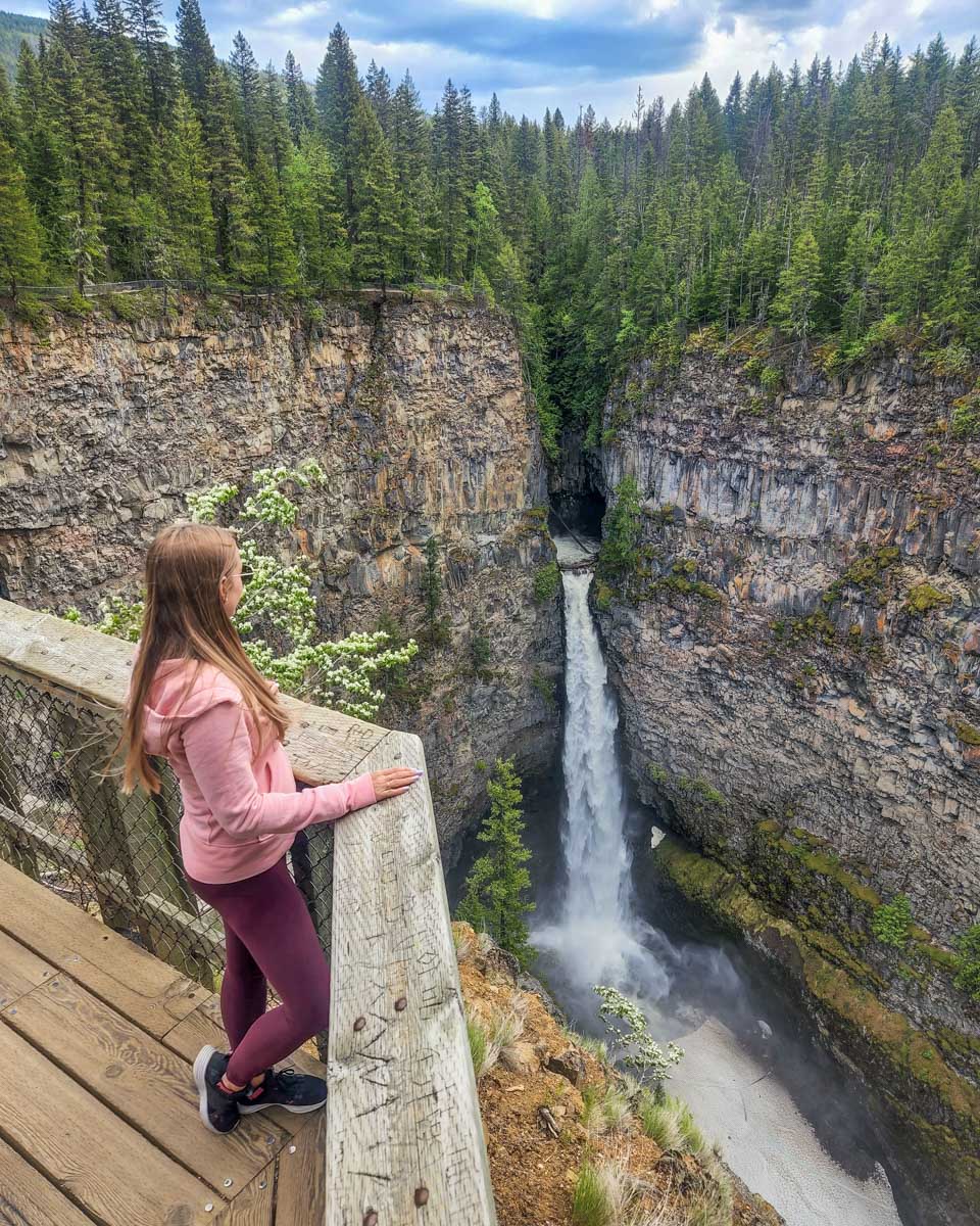 A lady at Spahats Creek Falls in Wells Gray Provincial Park, Clearwater, BC
