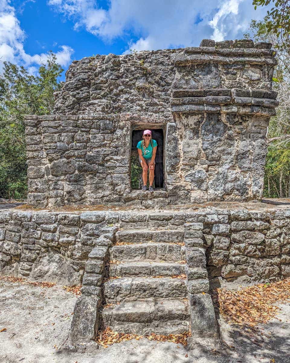 Bailey climbs one of the temples at Zona Arqueológica San Gervasio on Cozumel, Mexico