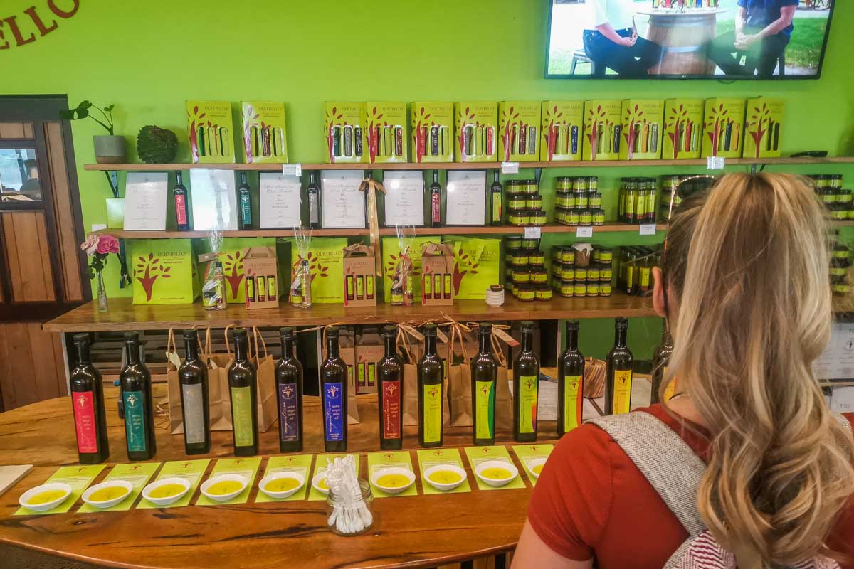 Bailey tastes olive oil at Olio Bello in Margaret River region, Western Australia