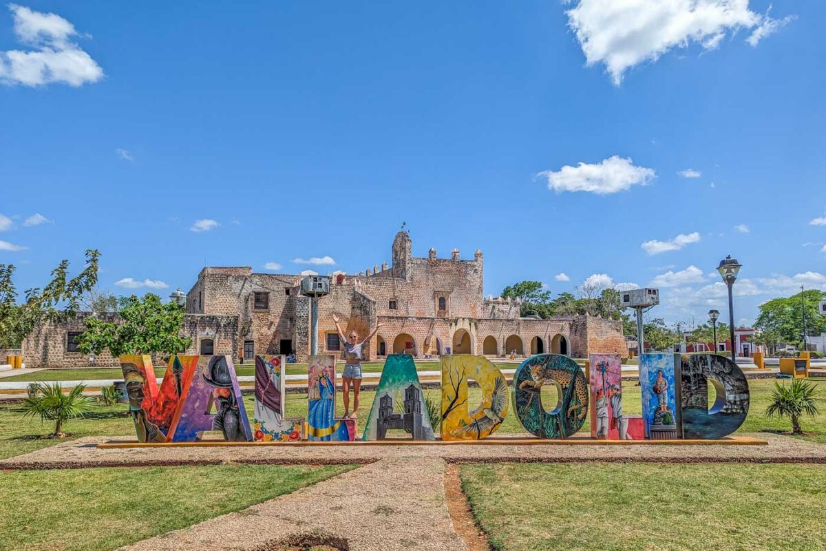 Bailey poses for a photo with the Valladolid Sign