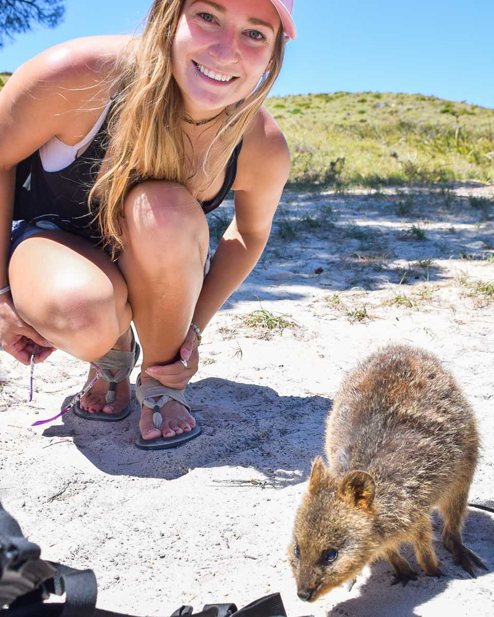 Bailey takes a selfie with a Rottnest Island quokka