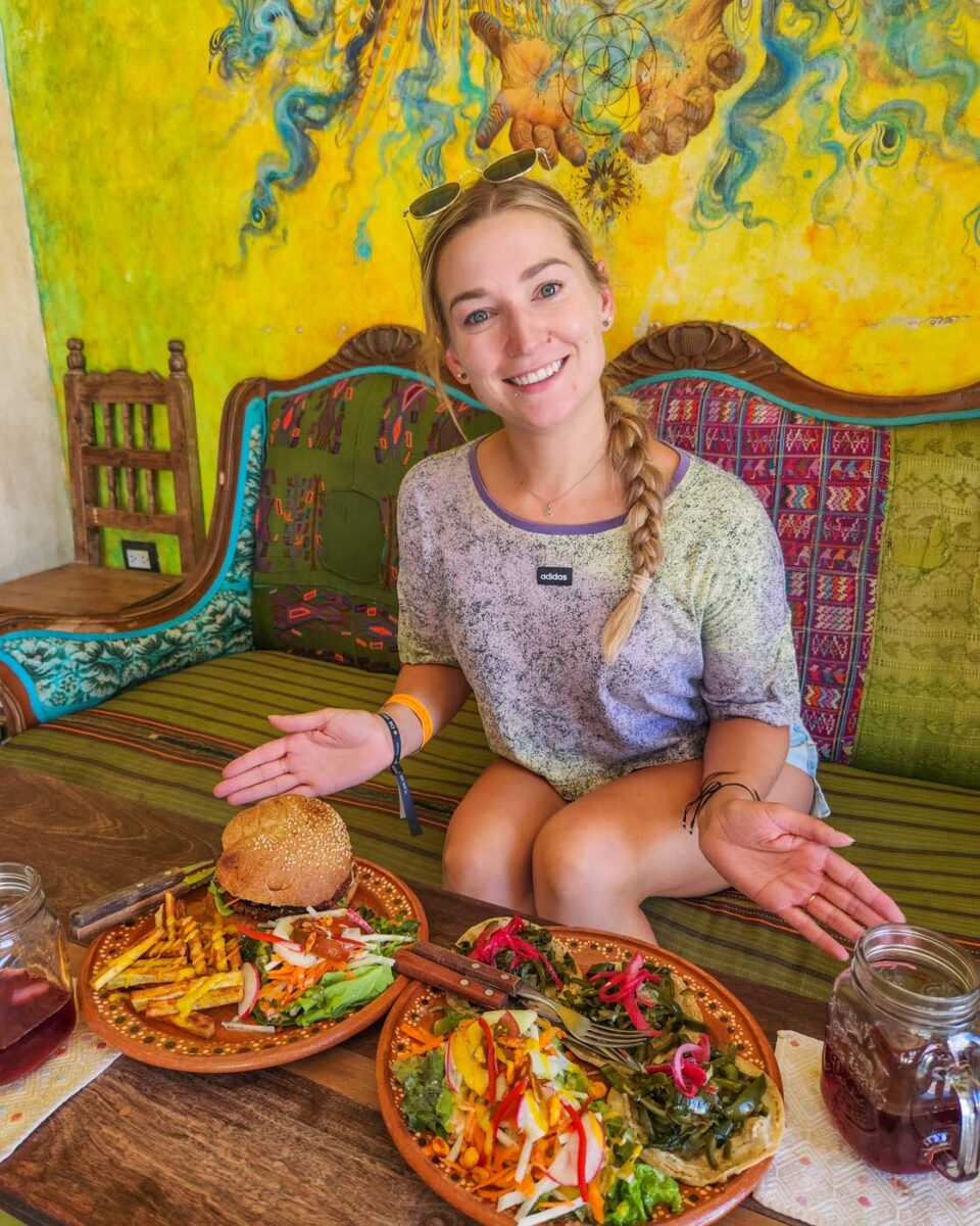 Bailey with her food at Elela Organic Vegan Cafe and Restaurant