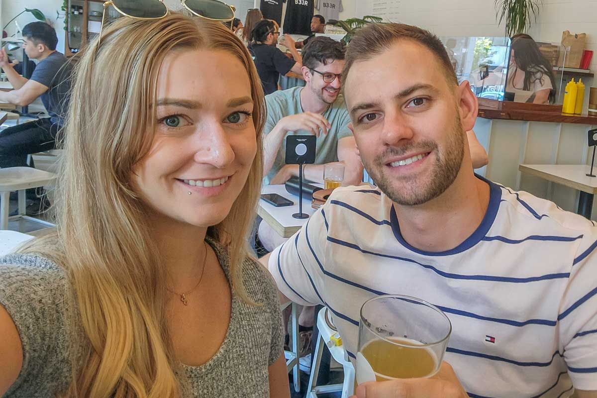 Daniel and Bailey take a selfie in Valparaiso, Chile with a beer in hand