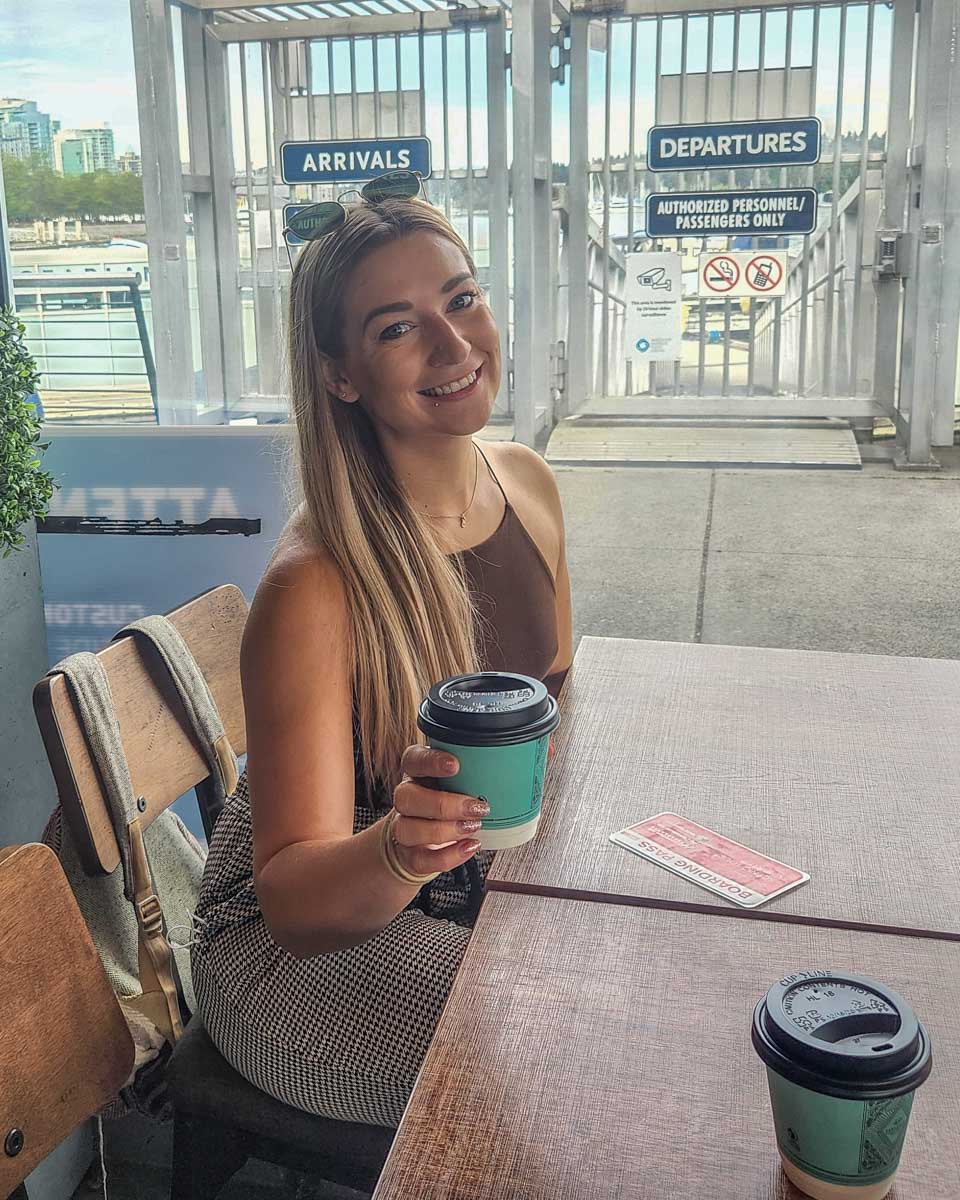 Bailey with a coffee at the sea plane airport terminal in Coal Harbour in Vancouver, Canada