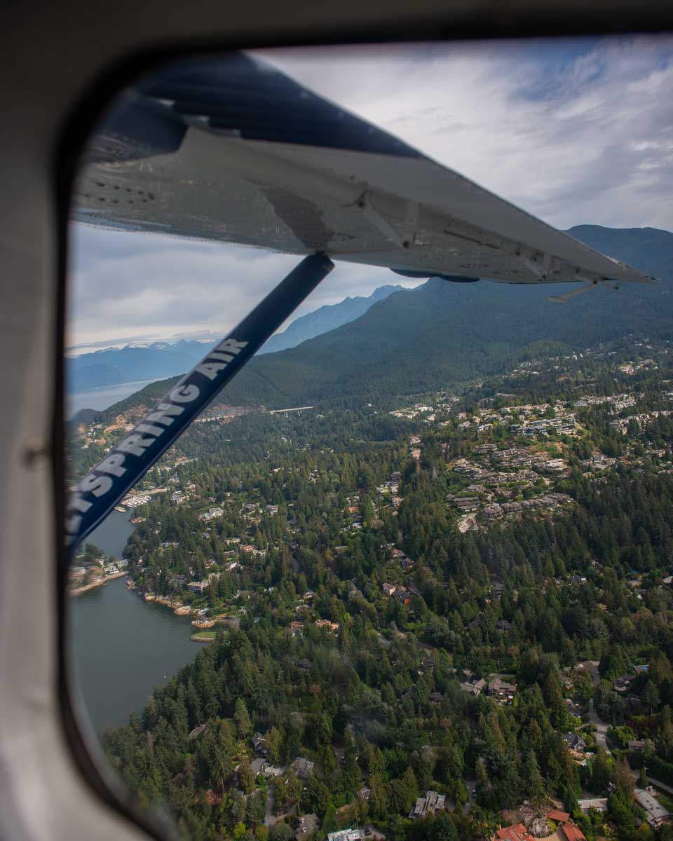 View out the window of a sea plane over Vancouver, Canada