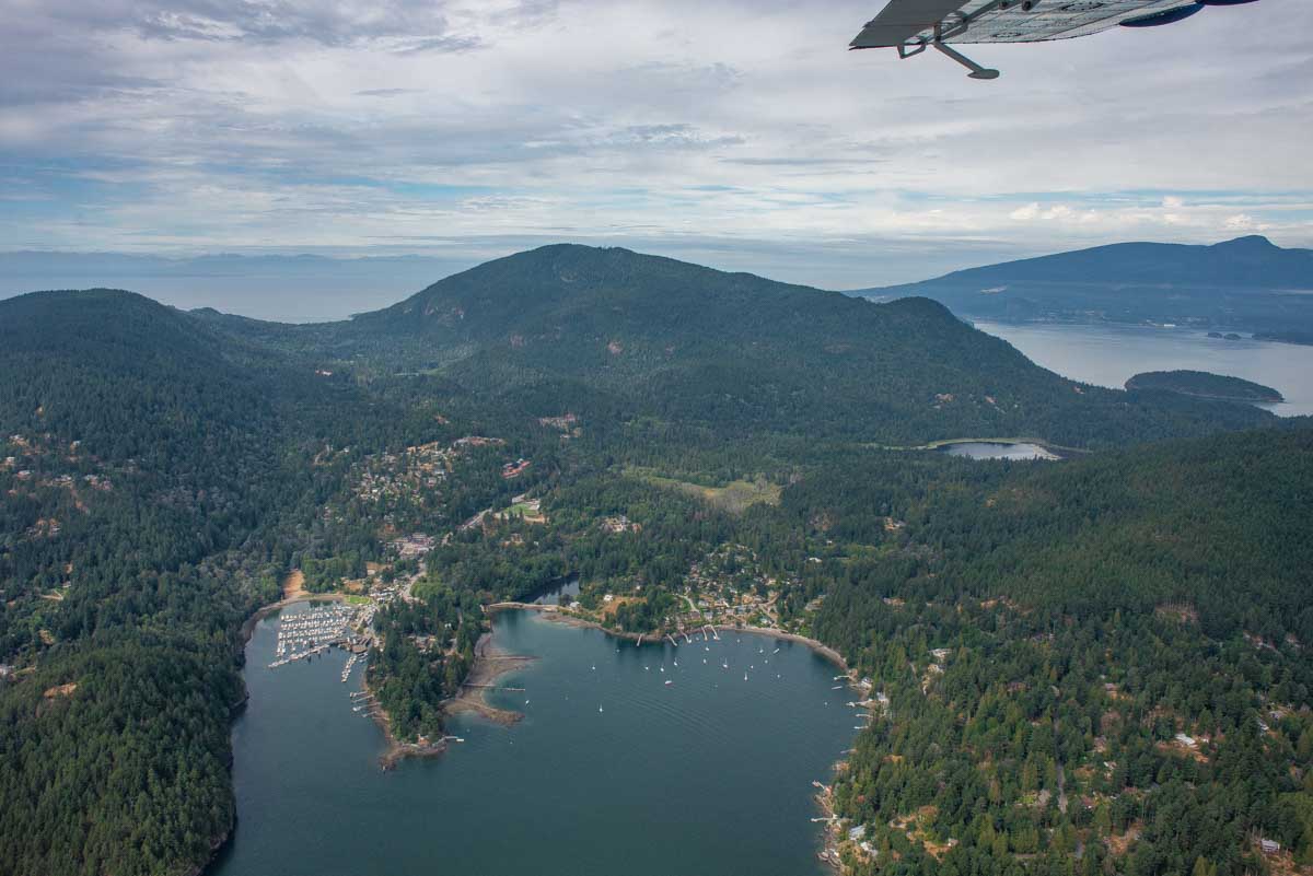 A scenic view out the window of a float plane on Vancouver Island