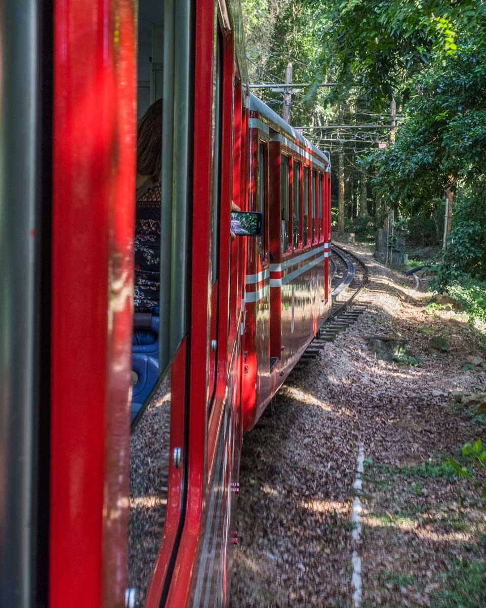 A train travels up to the christ the Redeemer statue in Rio de Janeiro, Brazil