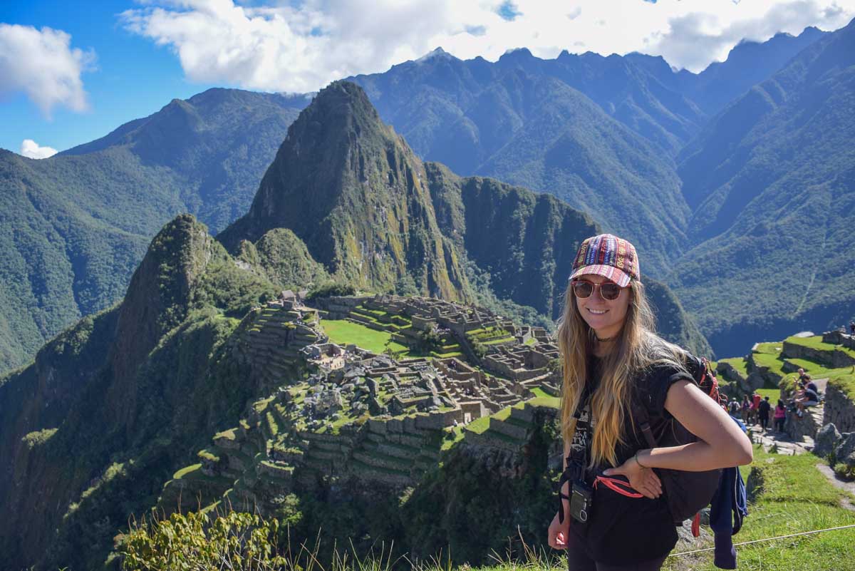 Bailey poses for a photo with Machu Picchu, Peru