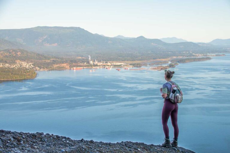 Bailey stands at the top of Mount Erskine looking at the view on Salt Spring Island