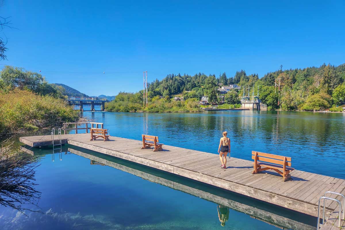 Bailey walks along a dock at Lake Cowichan  
