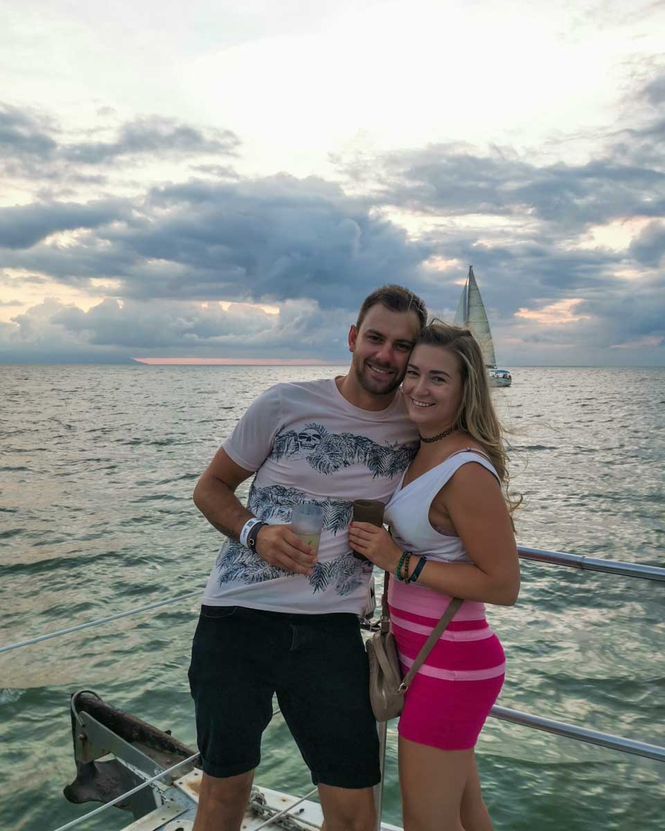 Daniel and Bailey take a photo together on the boat tide to the Rhythm of the Night show in Puerto Vallarta, Mexico