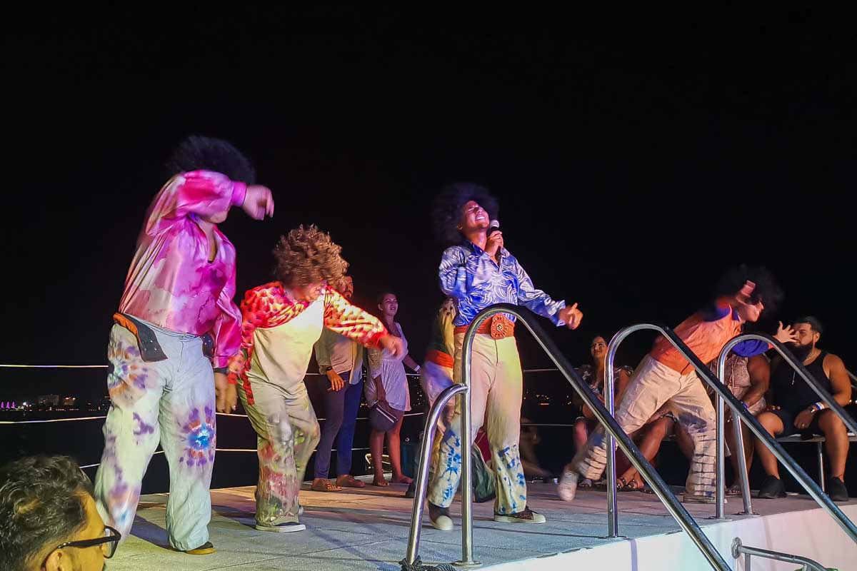 People perform on the boat ride back to Puerto Vallarta at the Rhythms of the Night show in Puerto Vallarta