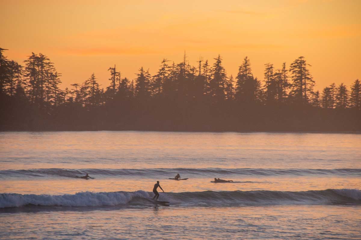 Surfers at Long Beach in Pacific Rim National Park, Vancouver Island