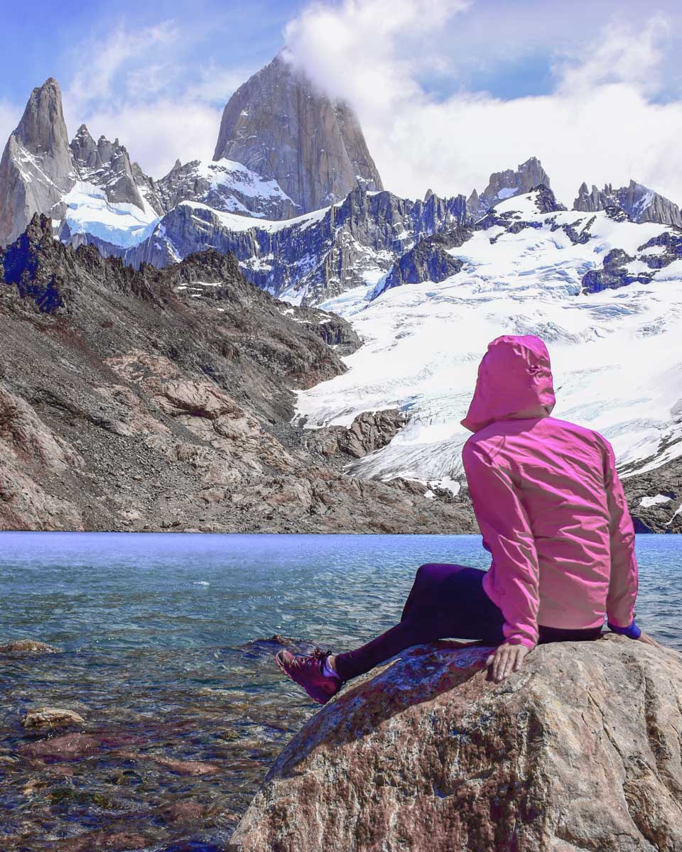 Bailey sits on a rock at Mount Fitz Roy Laguna de los Tres