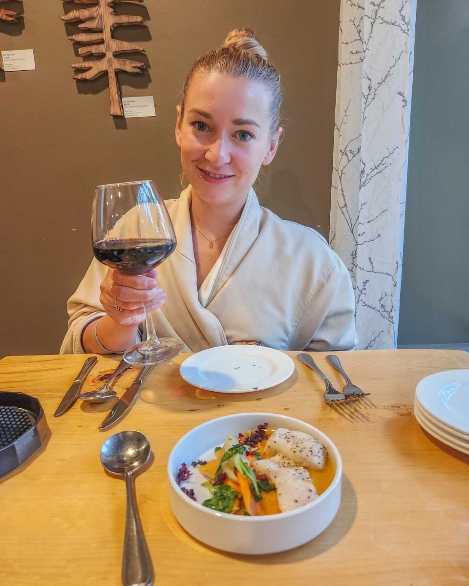 Bailey with a meal and wine at the 17 course dinner at Tigh-Na-Mara, Parksville