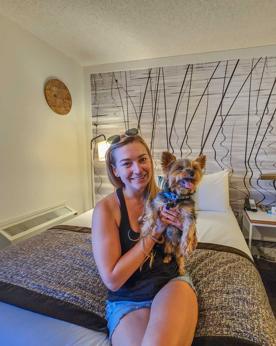 Bailey with her dog rex at a pet friendly room at Coast Canmore, Canmore, Alberta