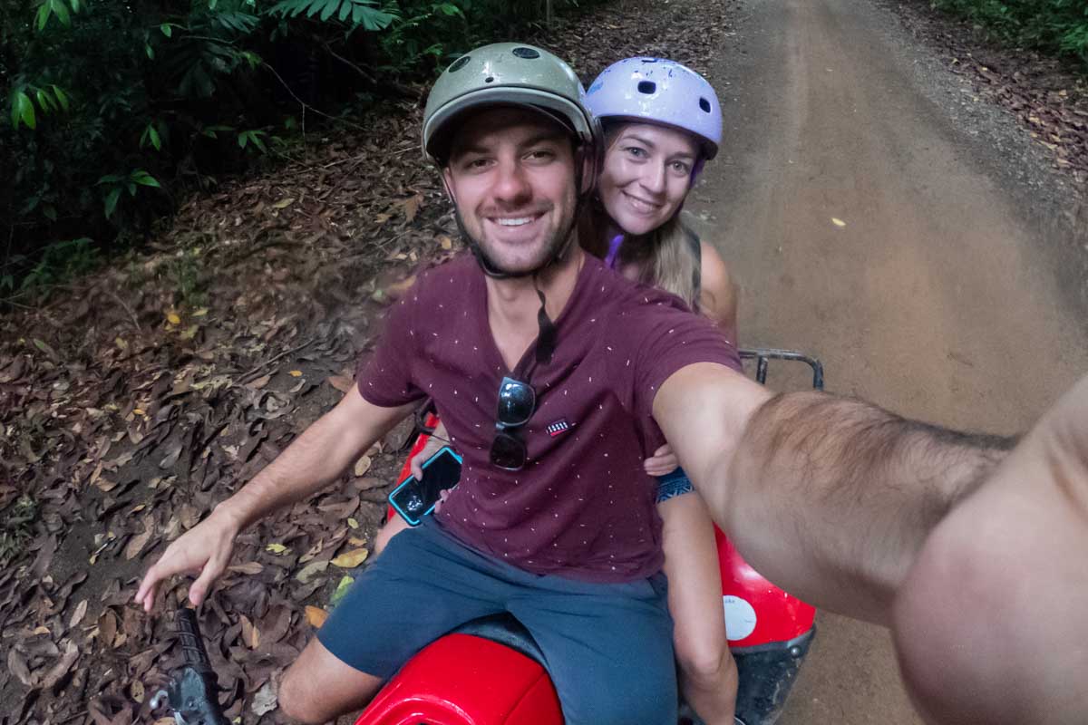 Daniel and Bailey take a selfie while wriding an ATV in Puerto Vallarta
