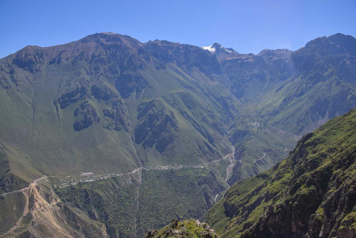 Photo showing the towns and paths through Colca Canyon from the top of the canyon