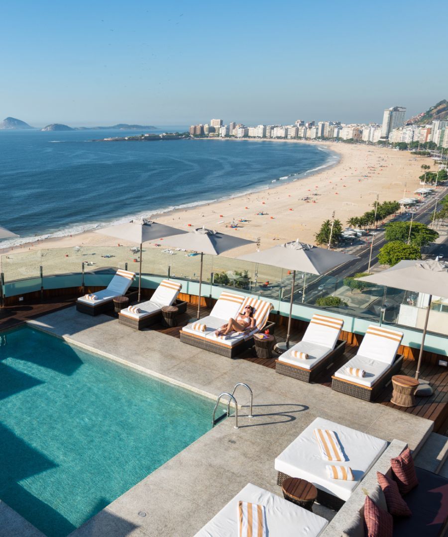 view of the pool and beach at PortoBay Rio de Janeiro