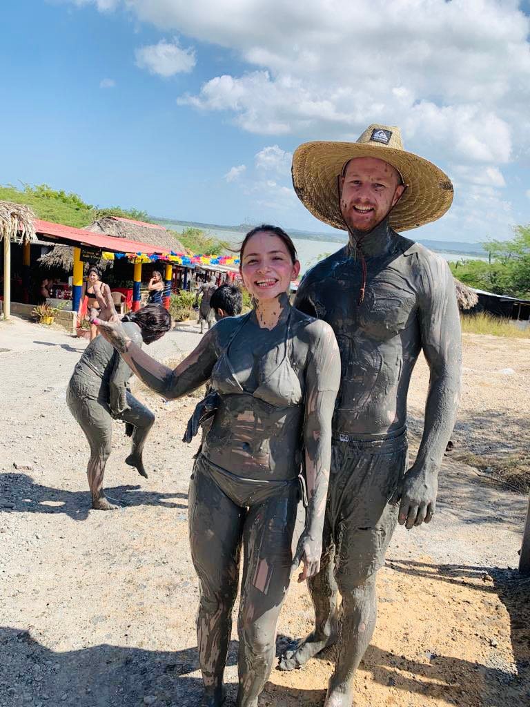two people covered in mud at the mud voclanoes in Cartagena