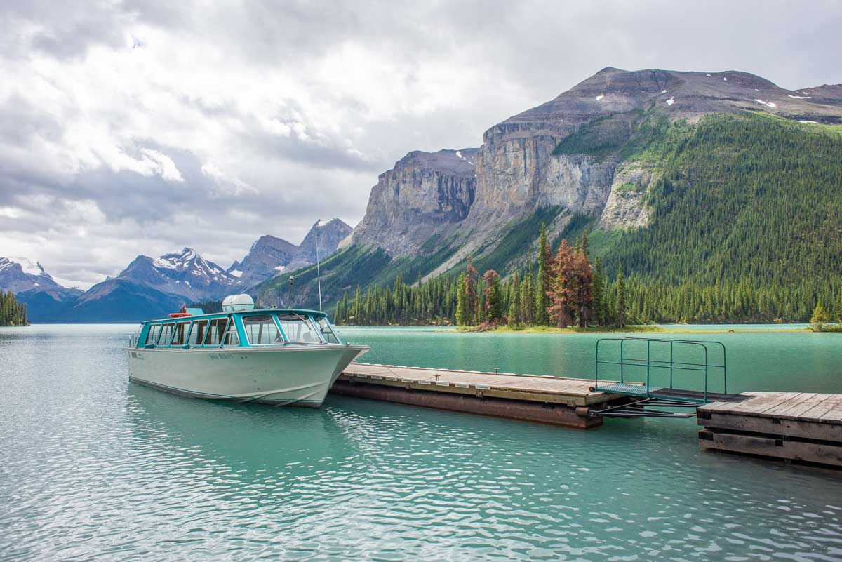 A boat sits at the dock at Spirit Island, Jasper National Park