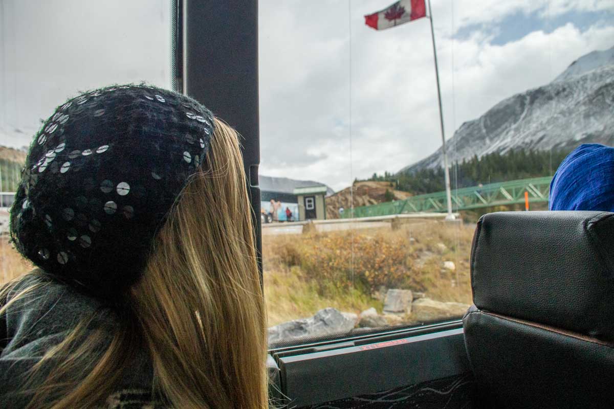 Bailey looks out the window of the bus that takes you to the Columbia Icefield Skywalk in Banff National Park