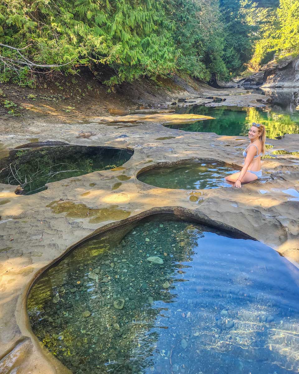 Bailey relaxes in the Oyster River Potholes in Campbell River, BC