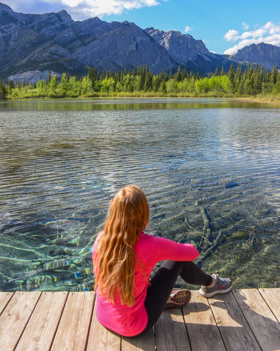 Bailey sits on the dock at Many Springs in Bow Valley Provincial Park, Alberta