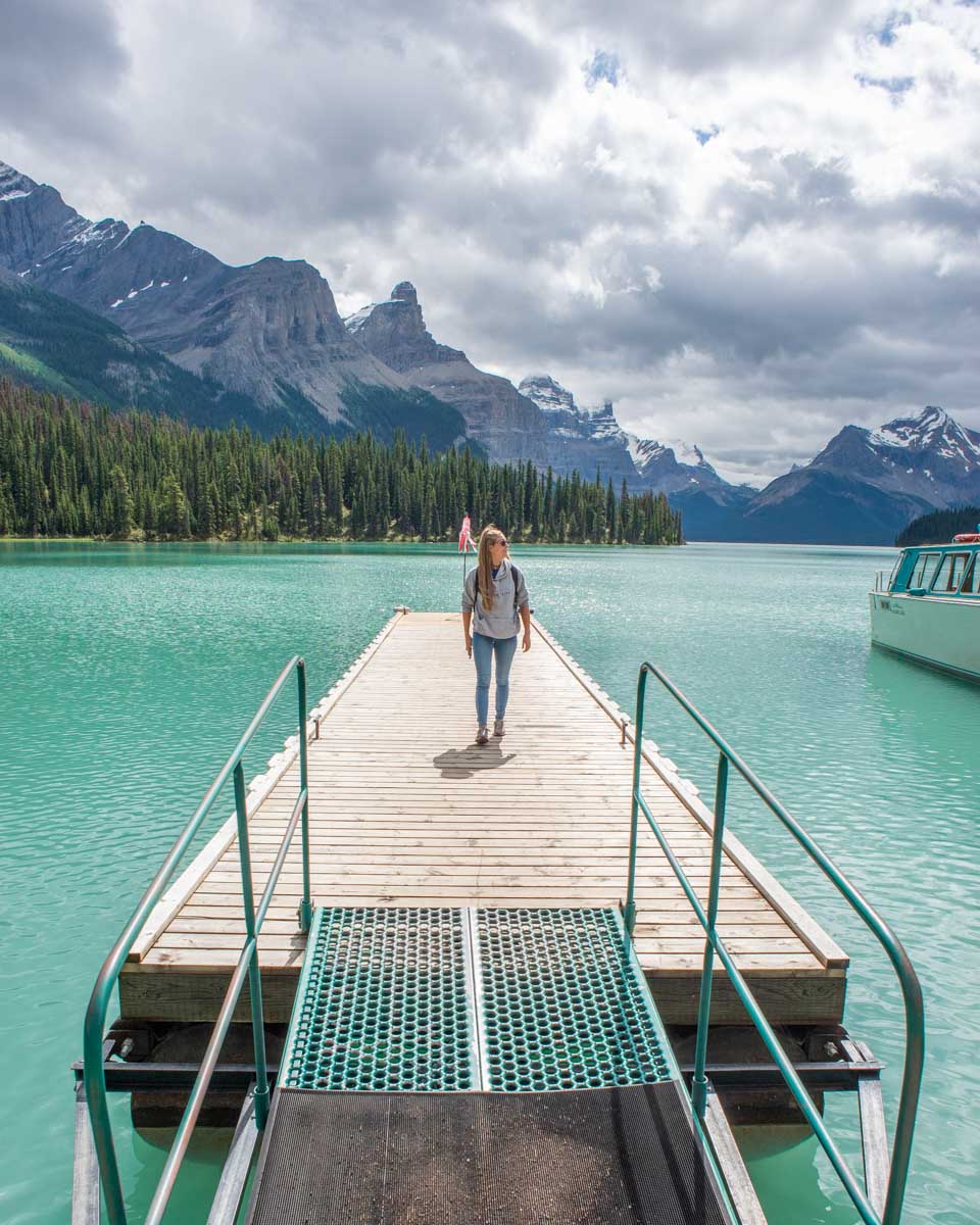Bailey walks the dock at Spirit Island on Maligne Lake, Canada